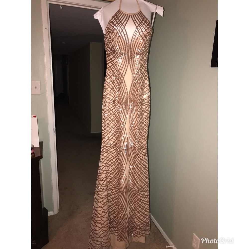 Dress is long from the back side to where it drags